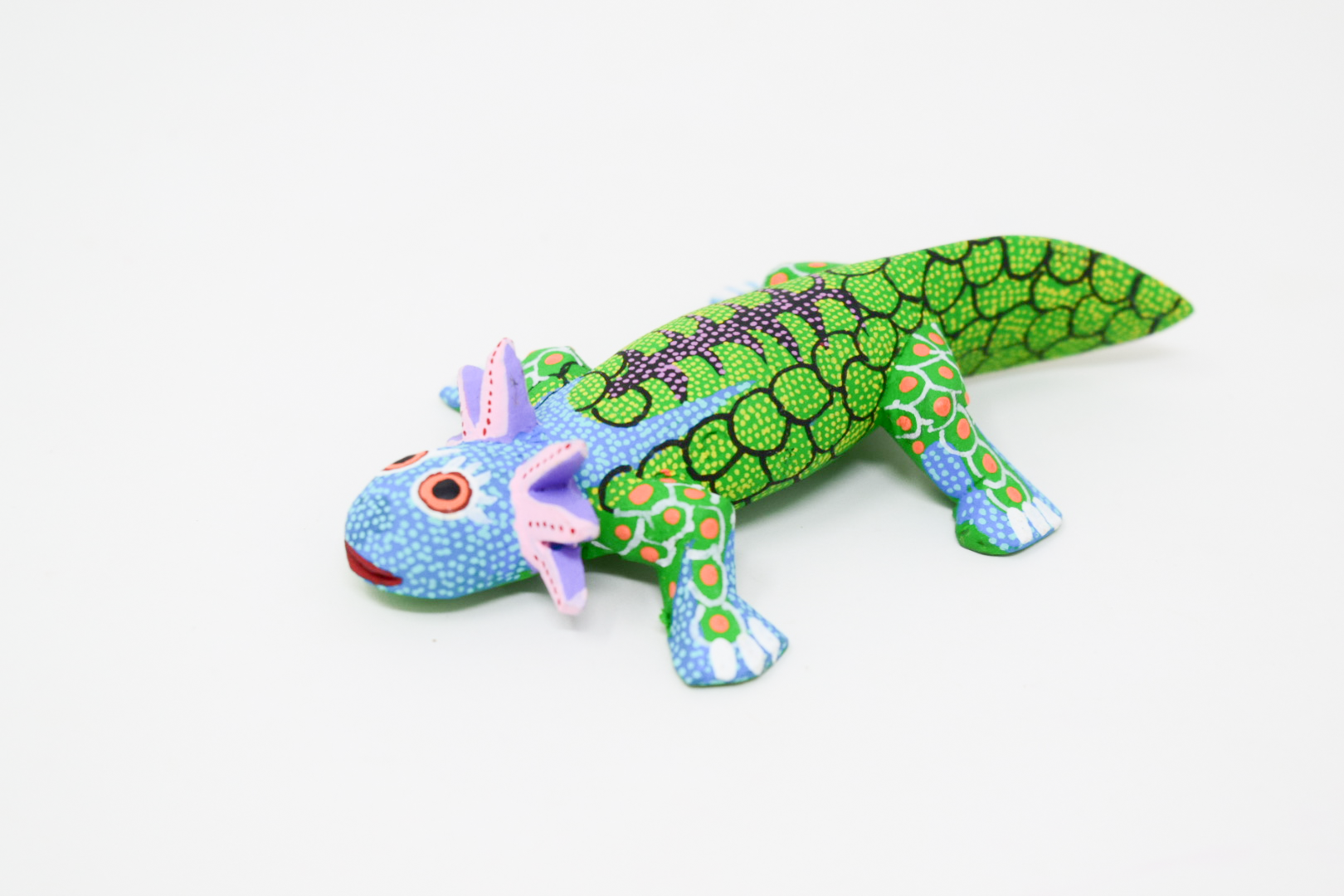A colorful handcrafted fabric axolotl 