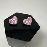 Heart-shaped pink and white patterned earrings 