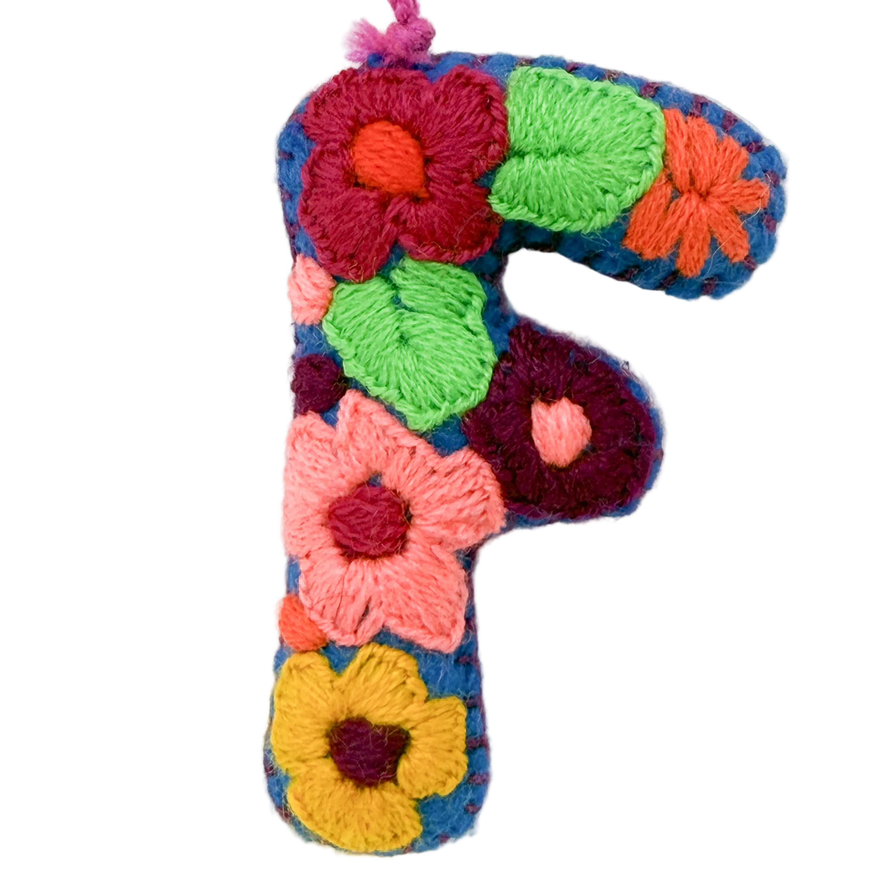 A handmade embroidered letter 'F' ornament 